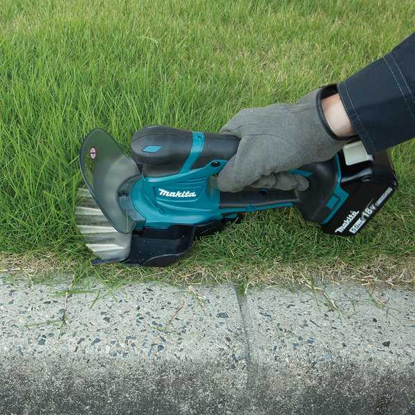 Makita DUM604RFX Akku-Grasschere 18V<br>